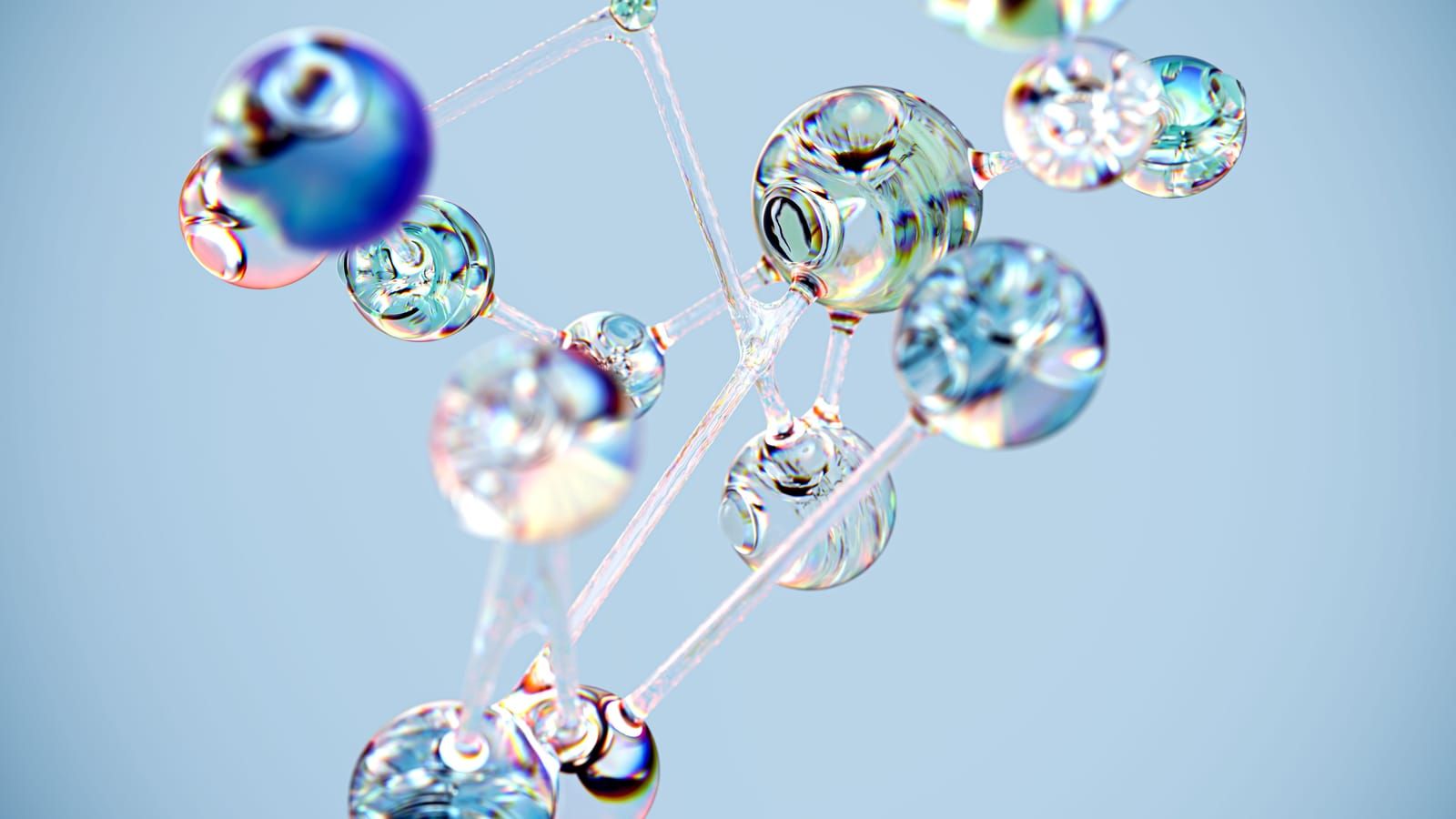 Glass model of a molecular structure, representing the peptide compounds sold by UK and EU research and cosmetic suppliers