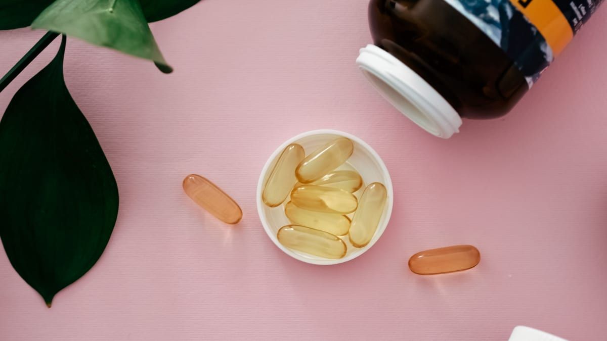 Omega-3 capsules and supplement bottles for a UK supplement retailer